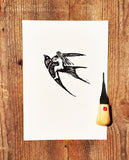אישה רוכבת על ציפור || הדפס במסגרת עץ צבועה שחור - נמכר